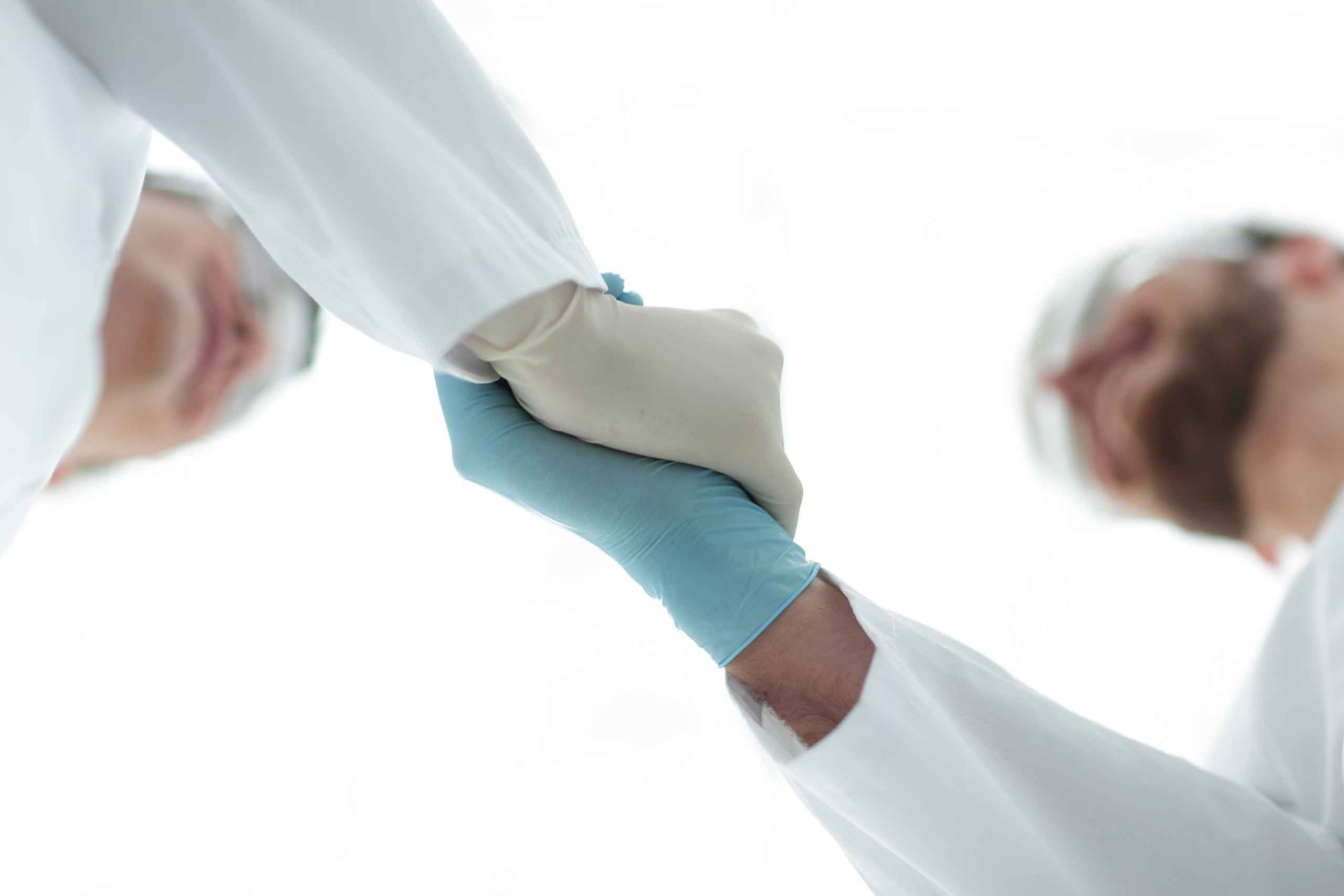 surgeons shaking hands image.